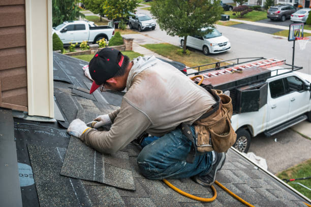 Professional Gutter Repair And Installation technician working in Port Jefferson Station, NY